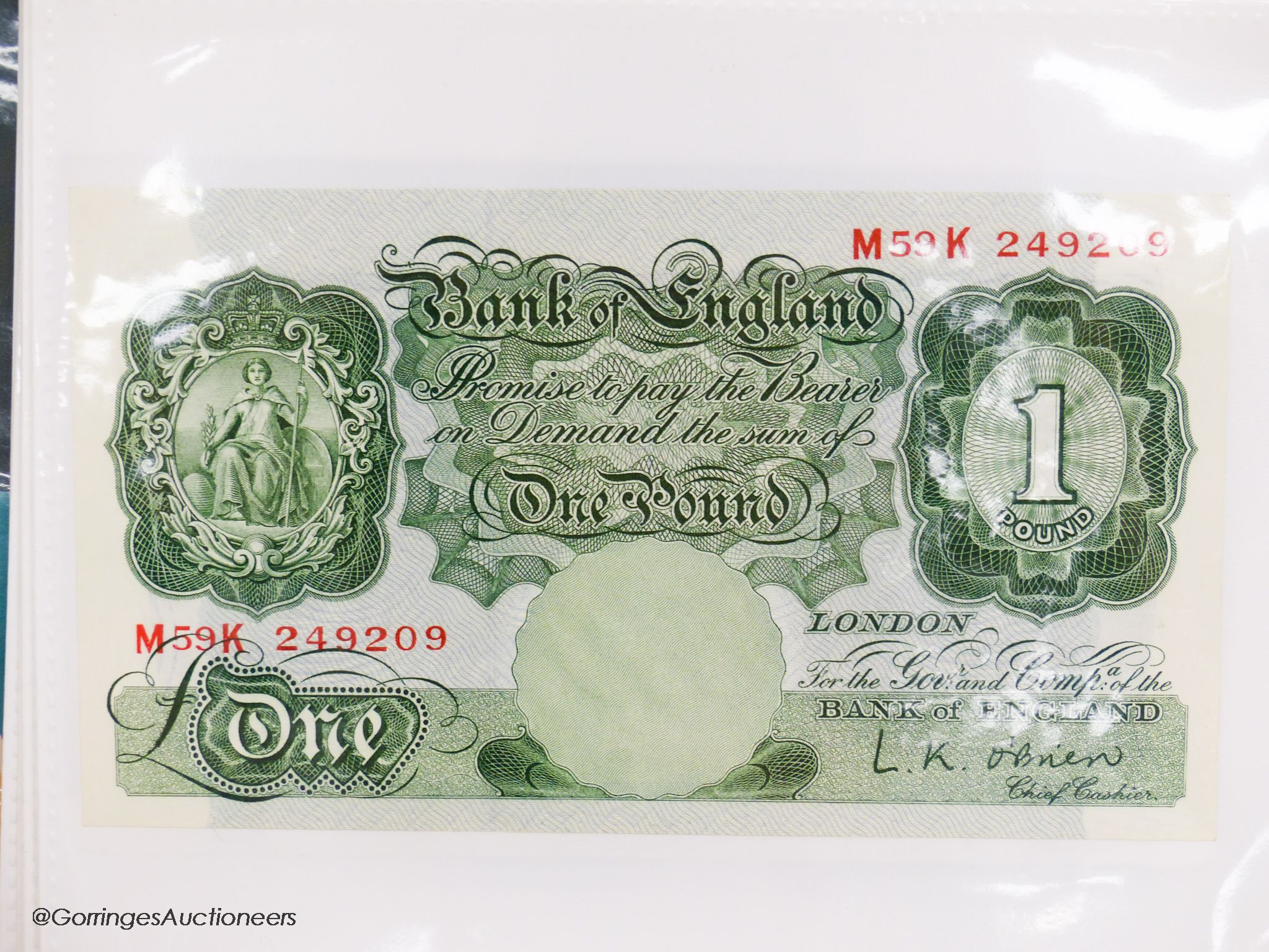 A collection of Bank of England and Scottish banknotes to include: 21 QEII 10 shillings, 14 O'Brien and Beale 10 shillings, 1 Peppiatt 10 shillings, 4 Hallam one pound notes, 18 O'Brien or Beale one pound notes, 8 Peppia